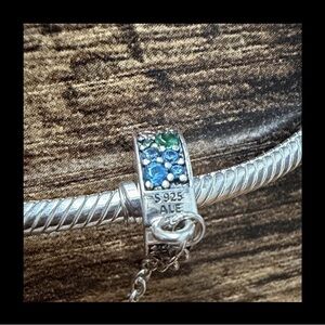 Pandora Rainbow Hearts & Cloud Safety Chain Charm, with silver bracelet.